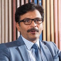 Ashwani Taneja (CA, CS, CMA, LL.B, LL.M, DISA, NCFM, FICA)