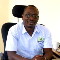 Dr. Charles Okidi