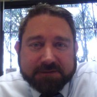 R. Joel Landau
