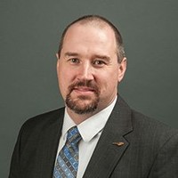 Gregory DeRuyter, MBA