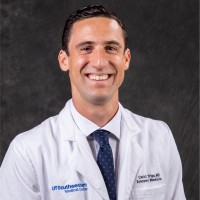 Carlos “Coco” Trigo , MD