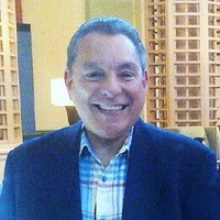 Carlos E. Alfaras