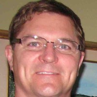 Mark T Holmes