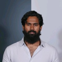 Thanuj B