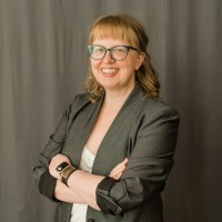 Becky Schlomann (She/Hers)