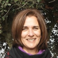 Cláudia L.