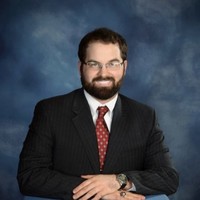 Andrew J. Dennis, Mba