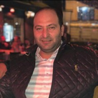 Ayhan Kam