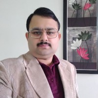 Dr Piyush Caroli
