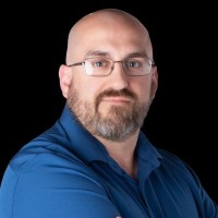 Travis Trussler P.Eng. PMP Q.Arb.  M.M.M.  C.D.