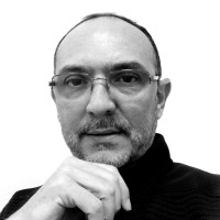 Carlos E. Alcalá