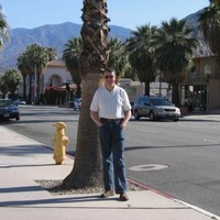 Malcolm Cowan 高馬勤 BSc Hons, C Eng, MIET