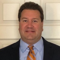 John Ahmuty, Che, Mba
