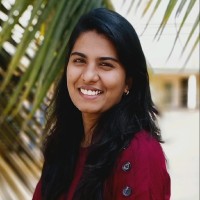 Nisha D