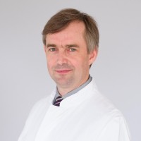 Dr. Guido Csomos