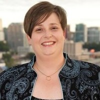 Mitzy Sharp Futro, Esq., CFRE