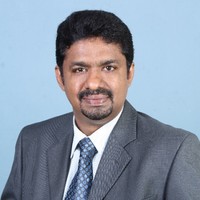 Dr ANIL V OOMMEN