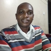 chris maundu