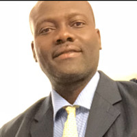 Dr. THEODORE M. YETONGNON