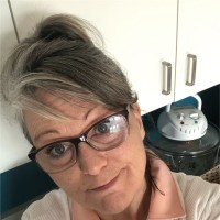Tina Caird