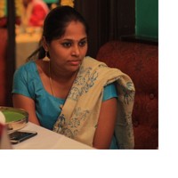 Nisha R
