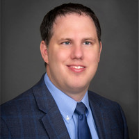 Tim J. Knecht