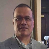 Amjad Riaz, Eit