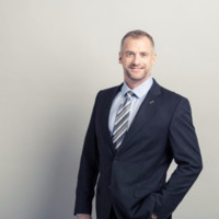 Andrew T.