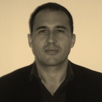 Gilbert Comos