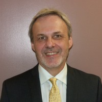 Stan E. Wolf, MAI