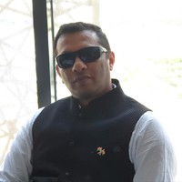 DINESH DHULAPKAR
