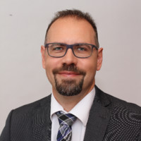 Marc E.