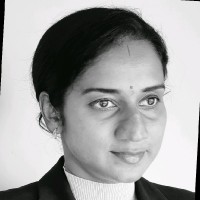 Dr Nidhi M B