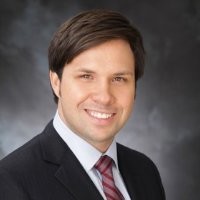 Adrian Szendel, Esq., CPCU, ARe