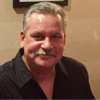 John Simonof