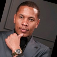 Gino J Adams
