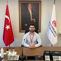 Cihan E.
