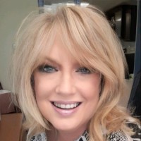 Kimberly Simpson, CIC, CERW, CPCC, CPRW