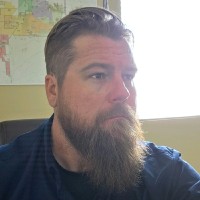 Adam W. Miller