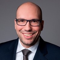 Dr. Alexander Reetz