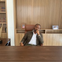 Dr. Kamsolibe Rhamsis