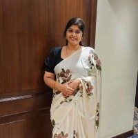Nikhila G