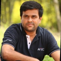 Adhil M