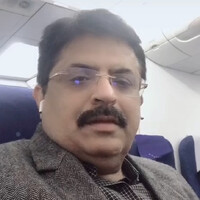 Dr Aseem Logani