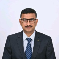 Dr.  Karunanithi D