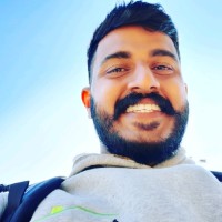 Nigesh C