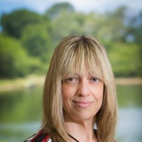 Lisa Maire, E.A., C.F.E.