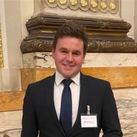 Chris Nicholson, Cfa, Fcca
