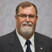 R. Wayne Pugh, MAI, CCIM, FRICS, CDEI
