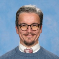 Mitchell J.